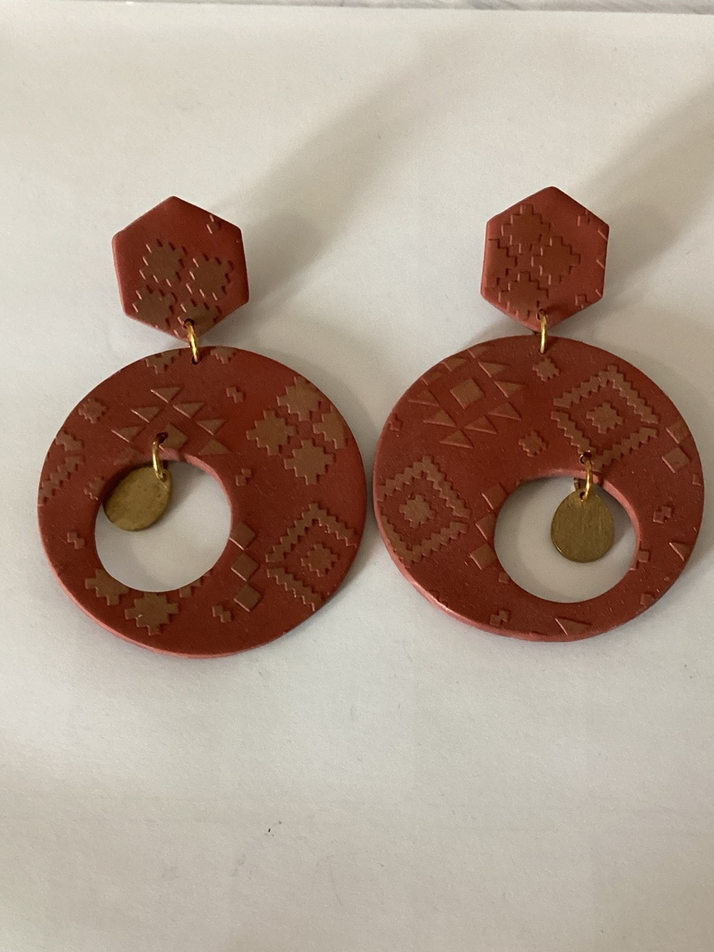 Rust Red Aztec Hoopโ Drop Earrings with Gold Accents